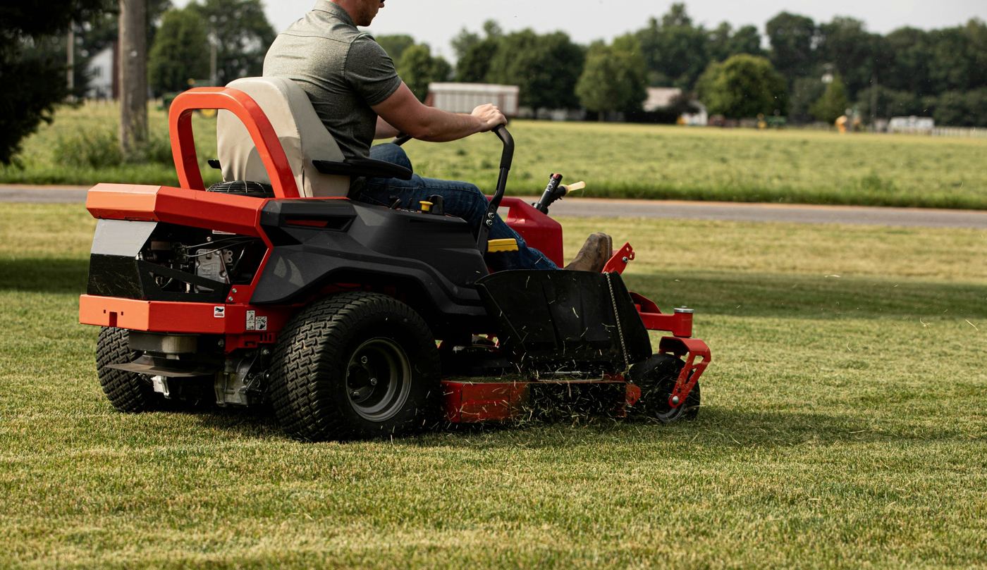 Zero-turn mower cutting a wide lawn