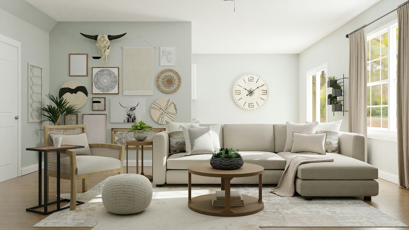 Tidy, sunlit living room with fluffed pillows and a folded throw
